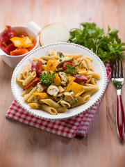 pasta with chicken and capsicum, selective focus