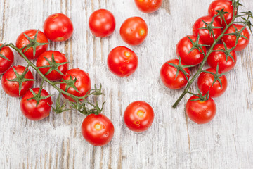 Tomatoes. Fresh cherry tomatoes with water drops.