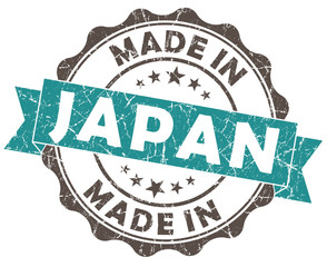 made in japan turquoise grungy seal isolated on white background