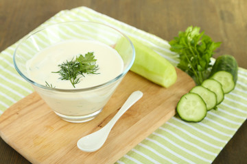 Cucumber yogurt in glass bowl,