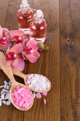 Spa treatments on color wooden background