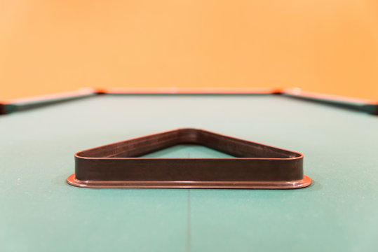 Empty Triangle Standing on Pool Table