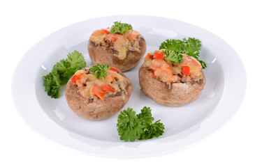 Stuffed mushrooms on plate isolated on white