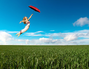 Flying girl with red umbrella