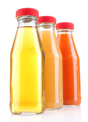 Baby food (juices) in glass jars, isolated on white