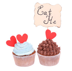 Tasty cupcakes with butter cream, isolated on white