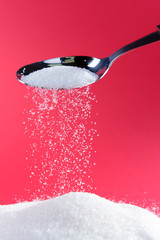 Sugar on red background