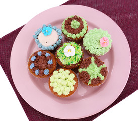 Tasty cupcakes with butter cream,