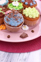 Tasty cupcakes with butter cream,