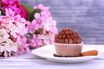 Tasty cupcake with butter cream,