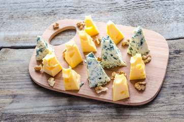 Pieces of emmental and blue cheese