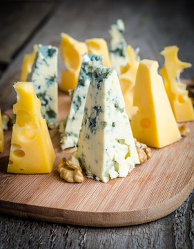 Pieces of emmental and blue cheese