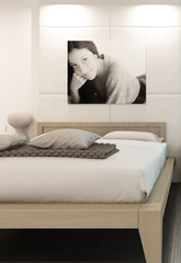 Luxury white bedroom interior with portrait of a woman