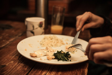 Hands at breakfast table