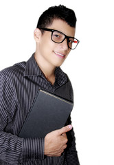 young and handsome man with books