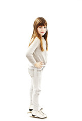 Little girl with ice skates on white background