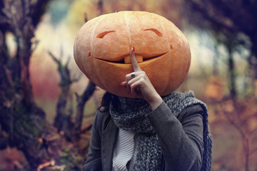 halloween girl with pumpkin head