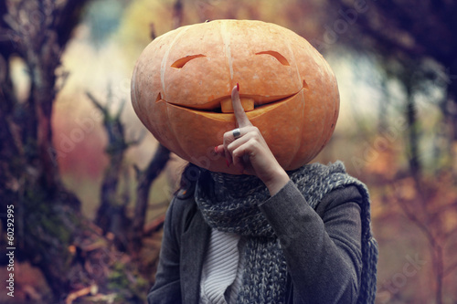 halloween girl with pumpkin head