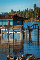 Fototapeta na wymiar Stilt hut in a lake