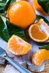 Fresh ripe mandarines  clementines with leaves