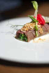 Image of tasty meatloaf with parsley on dish