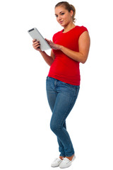 Young female using tablet pc