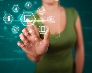 Girl pressing virtual media type of buttons