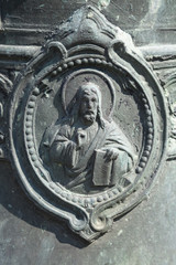 Jesus Christ embossed on bronze material