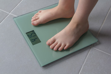 child weighing up