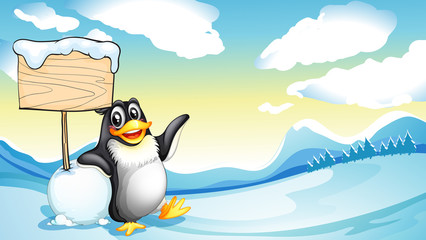 A penguin beside the empty wooden board