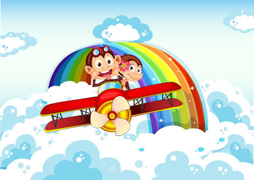 Playful monkeys riding on a plane near the rainbow