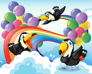 Three birds near the rainbow and balloons
