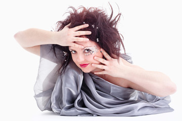 Portrait of Young Woman Lying on the Floor Looking