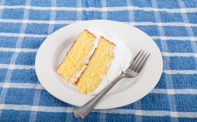 Fresh Coconut Cake on Blue Placemat