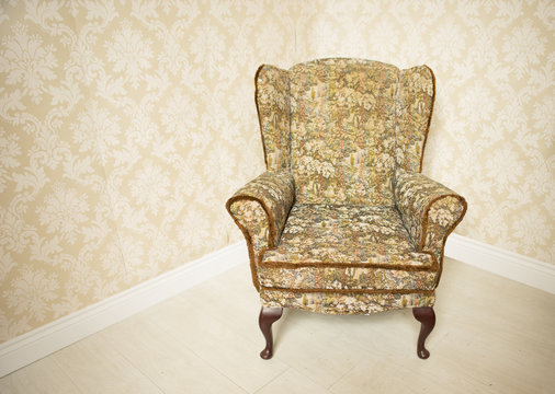 Stylish gold vintage armchair