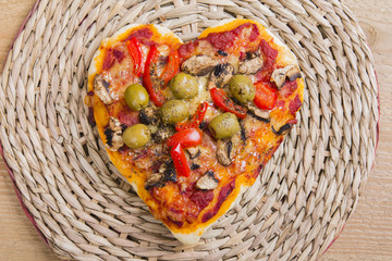 Obraz premium vegetarian pizza - heart shaped