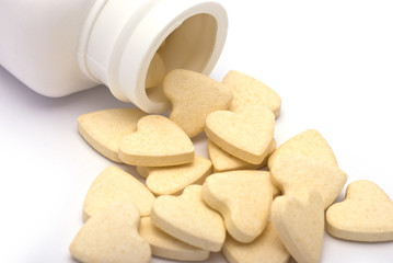 Heart-shaped Tablets  Spills from Container