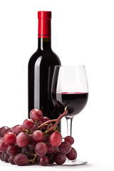 Fototapeta butelka i kieliszek czerwonego wina oraz winogrono obraz