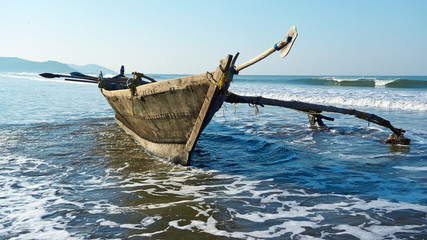 Indian traditional wooden fishing boat. GOA