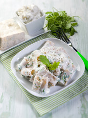 pasta with gorgonzola and arugula, selective focus