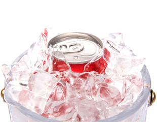 A can of cola drinks in an ice bucket