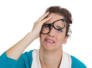 Portrait frustrated stressed woman with hand on face