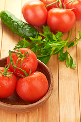 tomatoes in wooden bowlin