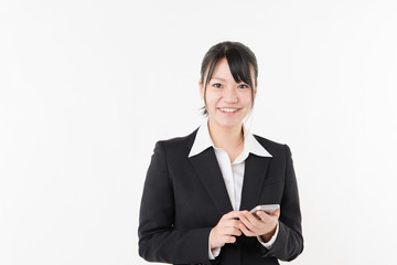 スマートフォンを持った女性ビジネスマン