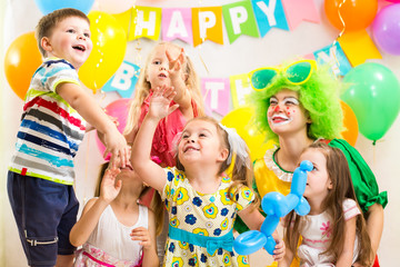 Fototapeta premium children celebrating .merrily birthday party