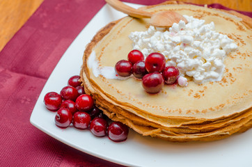 pancakes with cheese and cherries
