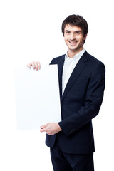 Businessman holding blank