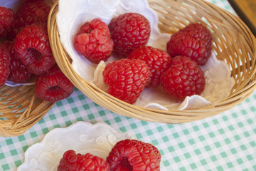 Raspberries in small baskets