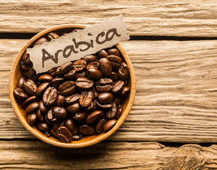 Bowl of Arabica coffee beans - obrazy, fototapety, plakaty
