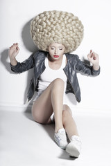 Eccentric Blonde Hair Model with Fantastic Updo Coiffure